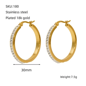 Macro view of 30mm 18k gold plated stainless steel hoop earrings with crystal pavé