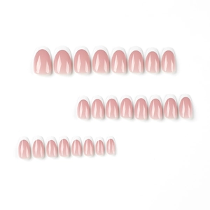 24-piece set of minimalist white French tip press-on nails in oval shape with nude pink base
