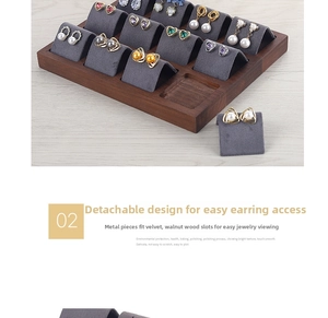 Macro detail of walnut earring organizer with grey velvet lining and removable slots