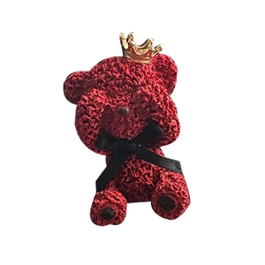 Red rose teddy bear car aromatherapy diffuser with gold crown on white background