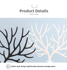 Detailed view of antler-shaped jewelry organizers in black and white glossy plastic finish