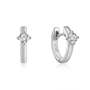 Detailed view of S925 sterling silver huggie earrings with double-row cubic zirconia