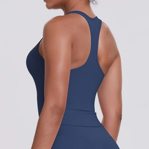 Detail of navy blue racerback sports vest showing the athletic cut and seamless fabric