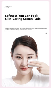 Close-up of soft food-grade square cotton pads used for facial makeup removal