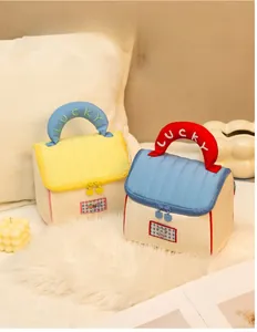 Detail of cute house-shaped makeup bag with LUCKY embroidery and large capacity