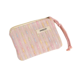 Pink tweed small makeup pouch with colorful texture and zipper for travel organization