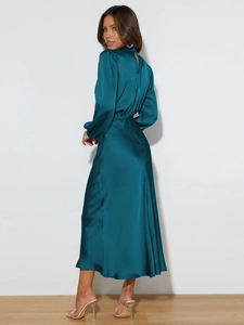 Rear view of elegant peacock blue satin maxi dress with high neck and puff sleeves