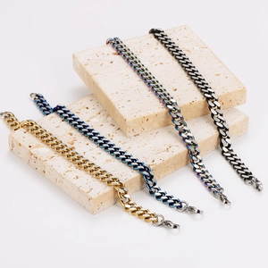 Modern 9mm stainless steel Cuban link bracelets in gold, blue, rainbow, and black finishes