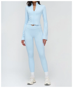 Front full view of women's light blue yoga set with stand collar zipper top and leggings