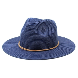 Close-up of a navy blue woven straw fedora hat featuring brown double cord detailing