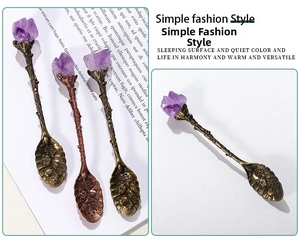 Macro detail of antique bronze stirring spoon with natural amethyst stone and floral pattern