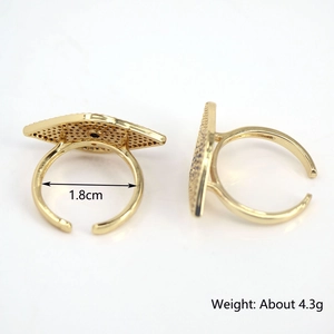Gold plated open eye ring with blue and black micro-inlaid zircons and 1.8cm diameter
