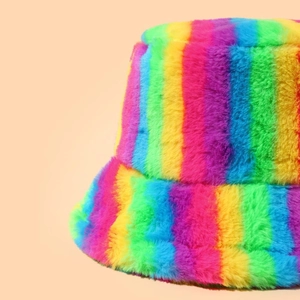 Rainbow striped faux fur bucket hat for women in warm winter plush material