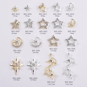 3D hollow star and moon alloy nail art charms in gold and silver finish with rhinestones