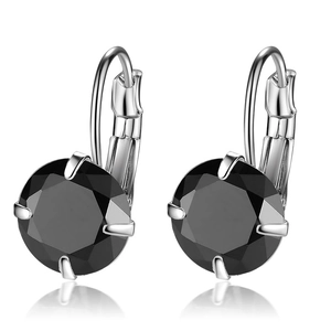 Close-up of black zircon earrings with silver metal and secure leverback closure