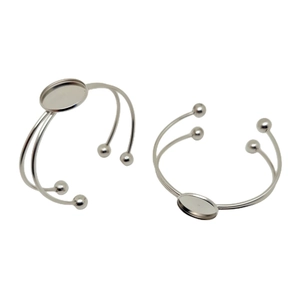 Detailed view of silver stainless steel double-layer C-shaped bangle with round base tray
