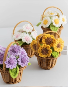 Macro shot of assorted handmade crochet sunflower mini baskets in purple and yellow colors