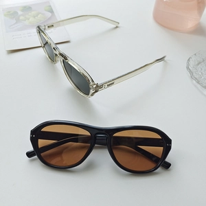 Vintage oversized sunglasses in black and transparent frames with tinted lenses