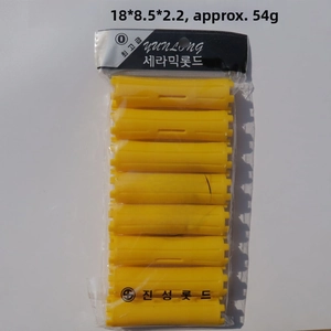 Detail view of 0# size yellow hair perm rods in transparent PVC bag packaging
