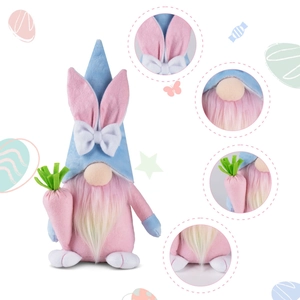Detail of Easter gnome featuring pink rabbit ears, plush beard, and carrot accessory