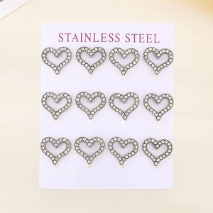 Detailed set of six pairs of heart-shaped stainless steel earrings with sparkling crystals