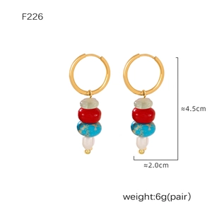 Detail view of colorful beaded hoop earrings with size measurements of 4.5cm by 2.0cm