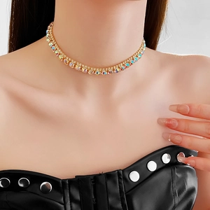 Close-up of a golden choker with square colorful rhinestones worn by a model