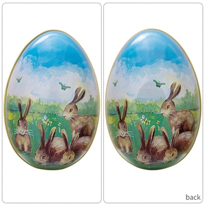 Front and back detail of Easter egg tin box with rabbit and meadow countryside pattern