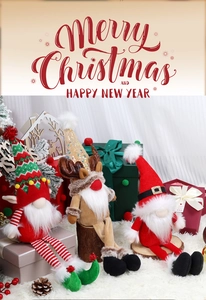 Close-up of Christmas gnome plush set with knit hats and sequins on a festive background