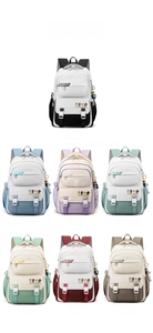 Multiple color options for students backpacks featuring cute bear patches and top flap design