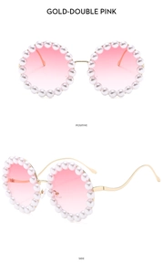 Detail view of round sunglasses with pearl-embellished frames and pink gradient lenses