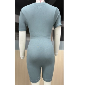 Close-up of seamless blue-grey knitted bodysuit with ribbed texture and slim-fit waist