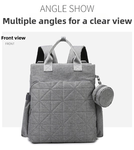 Detailed front view of gray quilted multi-functional diaper backpack with matching coin purse