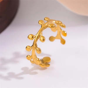 Minimalist gold olive leaf ring in stainless steel with adjustable open branch design
