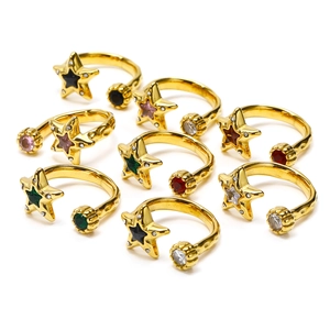 Set of nine gold-plated star rings with colorful gemstone accents and zircons