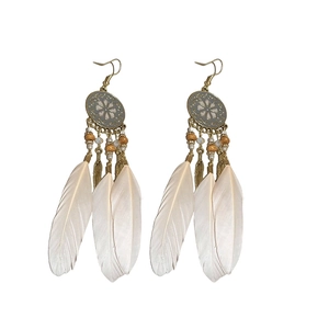 Bohemian off-white feather earrings with antique gold hooks and ethnic beads