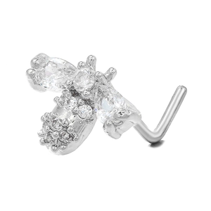 Detailed close-up of L-shaped silver nose stud with micro-set sparkling zircons