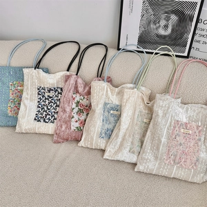 Selection of velvet tote bags featuring lace butterfly and floral embroidery detail