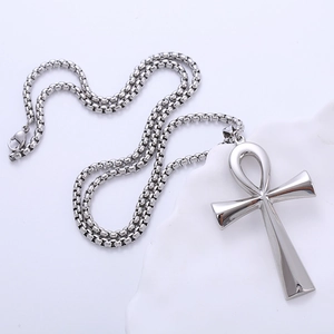 Silver stainless steel Ankh cross necklace on stone display with durable box chain