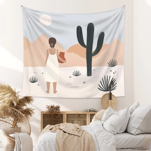 Bohemian tapestry featuring a desert landscape and woman illustration for wall decor