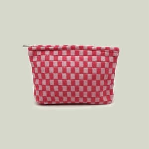Pink and white checkered knit makeup bag with top zipper and spacious storage
