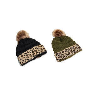 Winter knitted beanies with leopard pattern trim and fluffy faux fur pompom for warmth