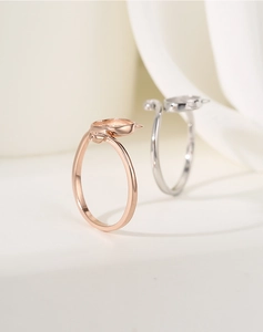 Macro shot of 925 silver cat-ear ring settings in rose gold and silver finish