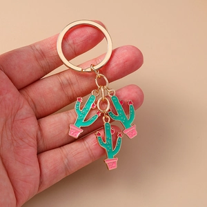 Pastel cactus keyrings with gold alloy hardware and enamel succulent charms for bags