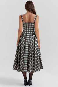 Back view of a French vintage plaid sundress with a hidden zipper and a large flowing hem