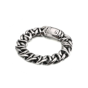 Heavy men's stainless steel Cuban chain bracelet with a polished silver metallic finish
