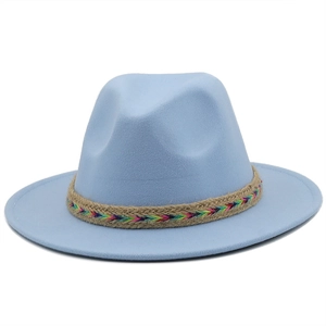 Detail of light blue wool fedora with a braided brown and rainbow strap on white background