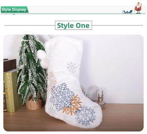 Detailed view of white faux fur Christmas stocking with embroidered blue and gold snowflakes