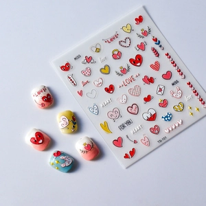 Detail of TS-101 heart nail art decals with colorful winged hearts and love letters