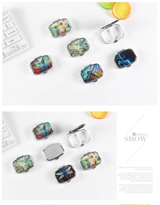 Macro view of portable metal pill box with colorful frog and hummingbird illustrations